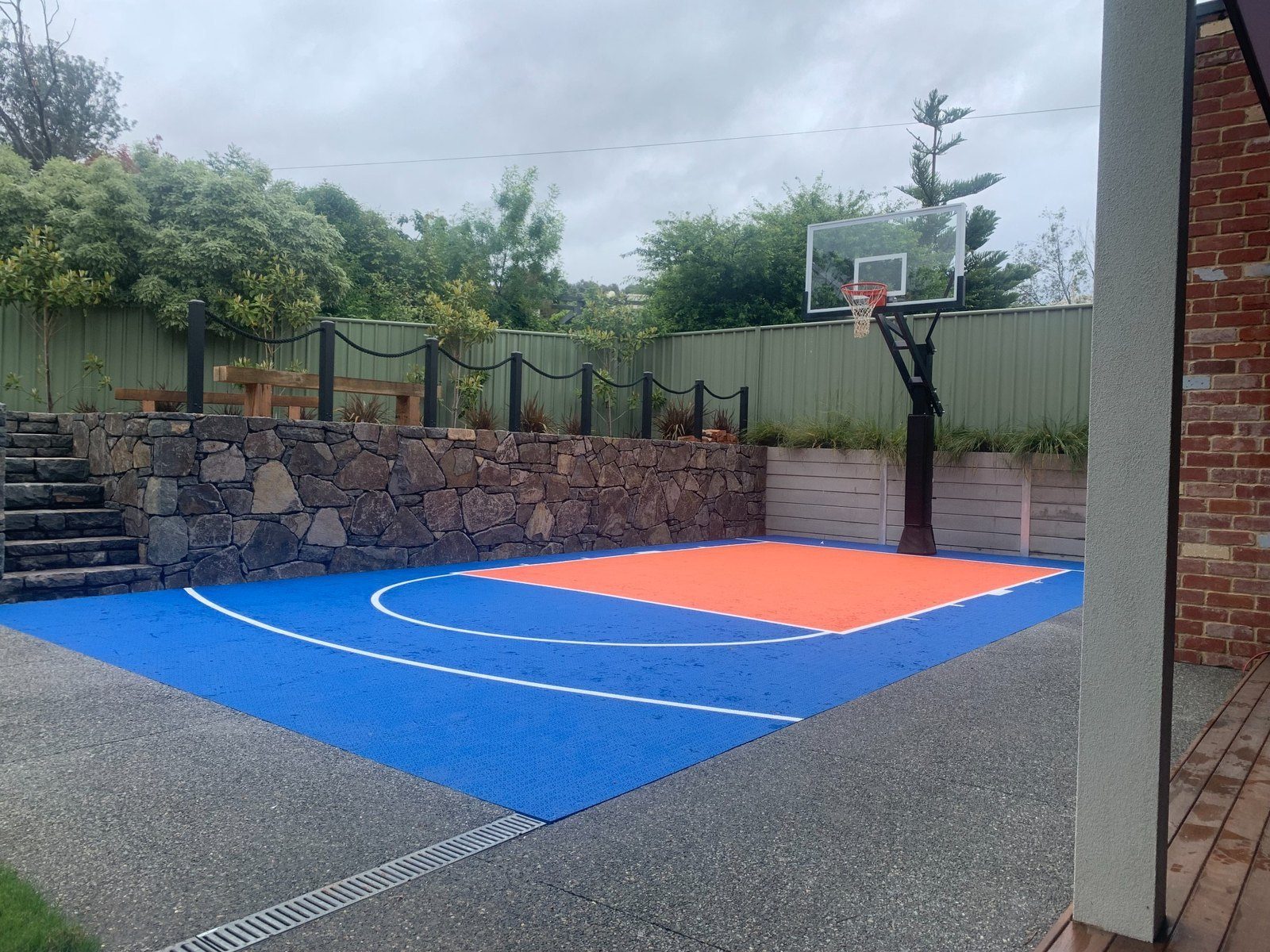 Backyard basketball court completed by ProFlo Pools